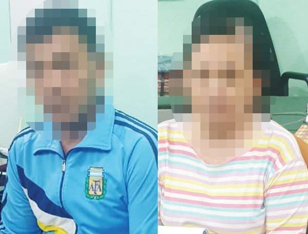 >> Kedua warga yang tertangkap tangan sedang merekap togel.