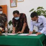 Walikota Caroll Senduk dan Ketua KPU Harryanto Lasut teken kesepakatan.