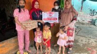 Alfamidi Salurkan ribuan telur